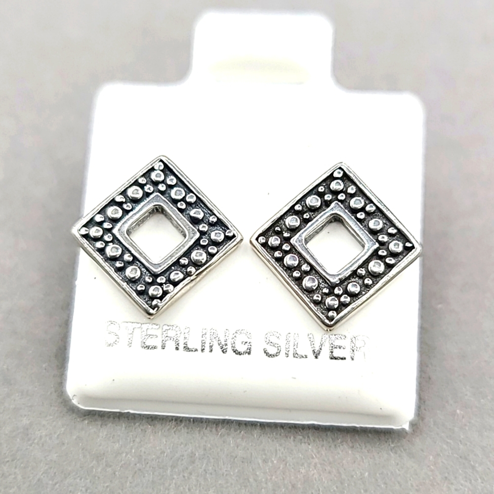 Sterling silver diamond-shape stud earrings